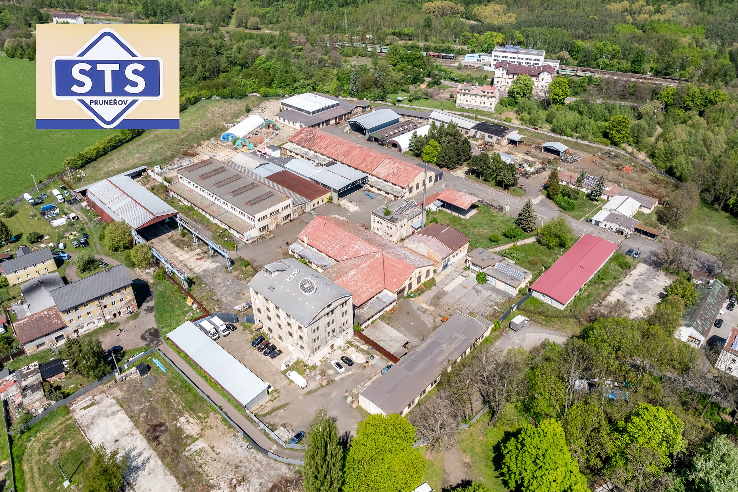 VEŘEJNÁ DRAŽBA - areál STS Prunéřov, a.s., užitná plocha 11.945 m2, pozemky celkem 55.965 m2, včetně strojního zařízení, Kadaň